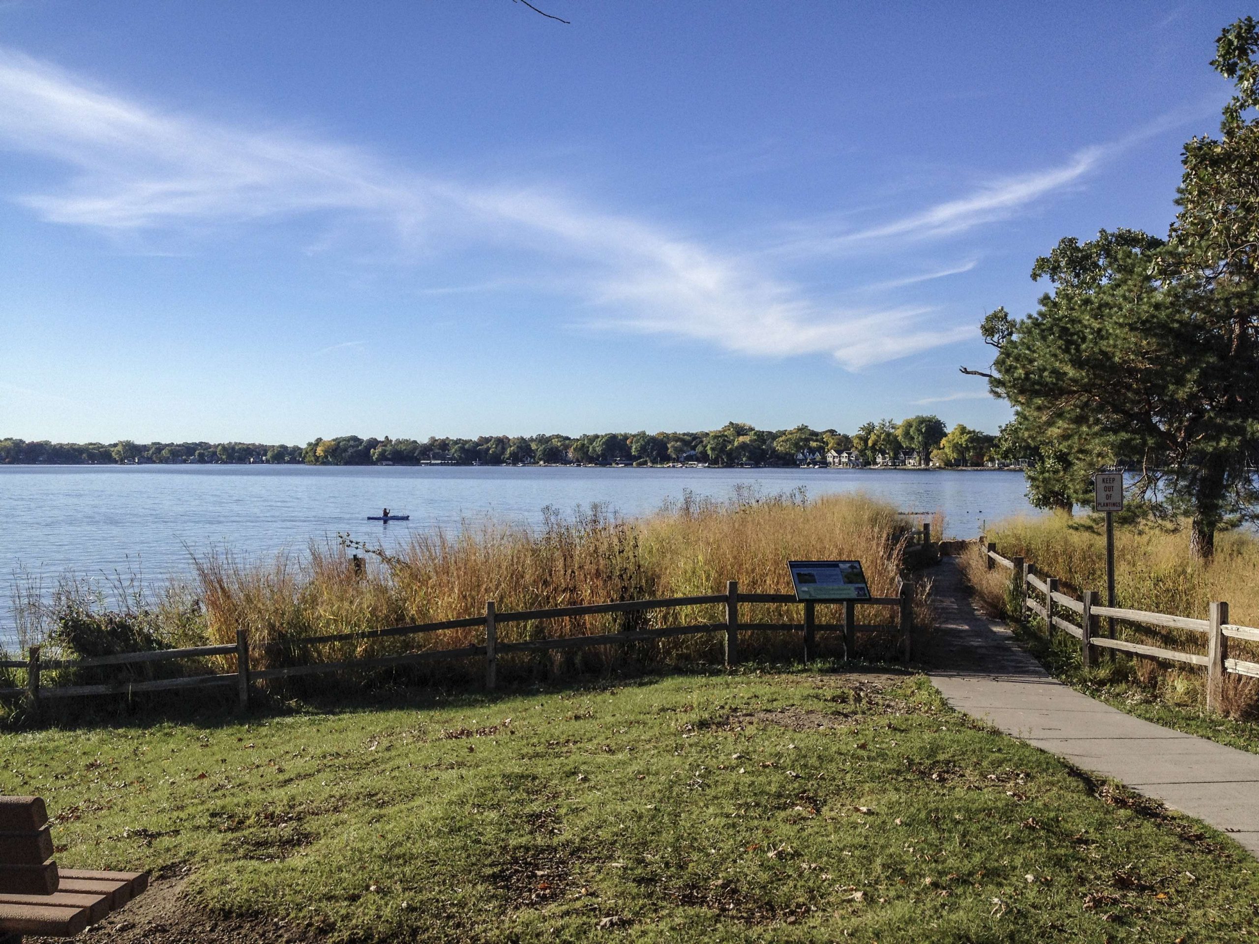 Lake Minnetonka is 14,000 acres and approximately 15 miles southwest of Minneapolis. 