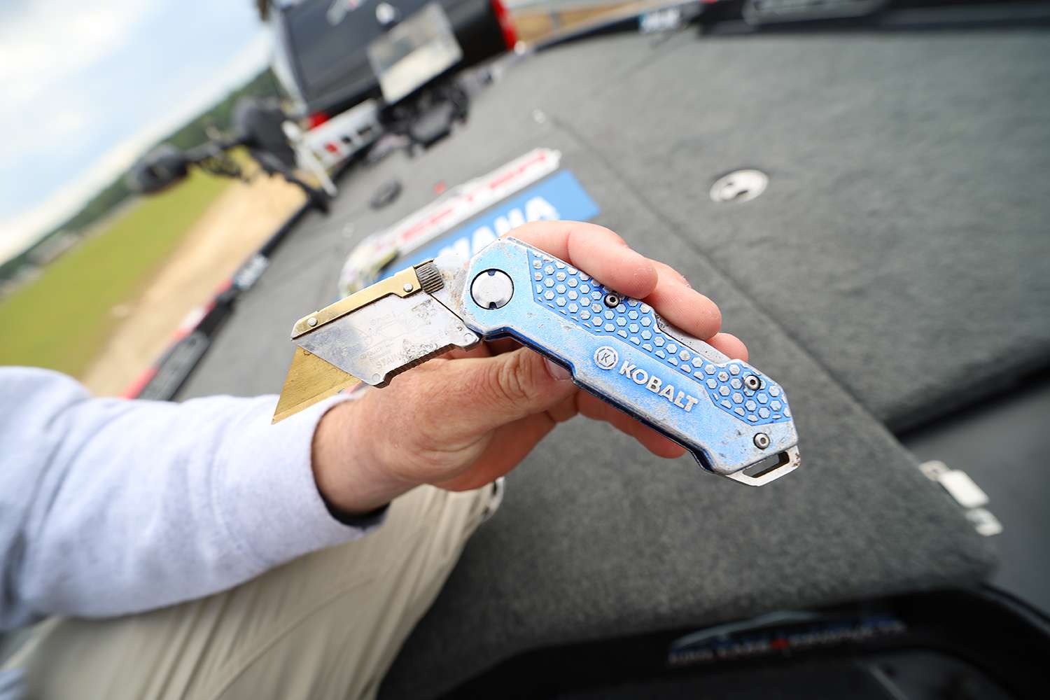 A utility knife is a very handy tool in a bass boat. He always keeps one at the ready. 