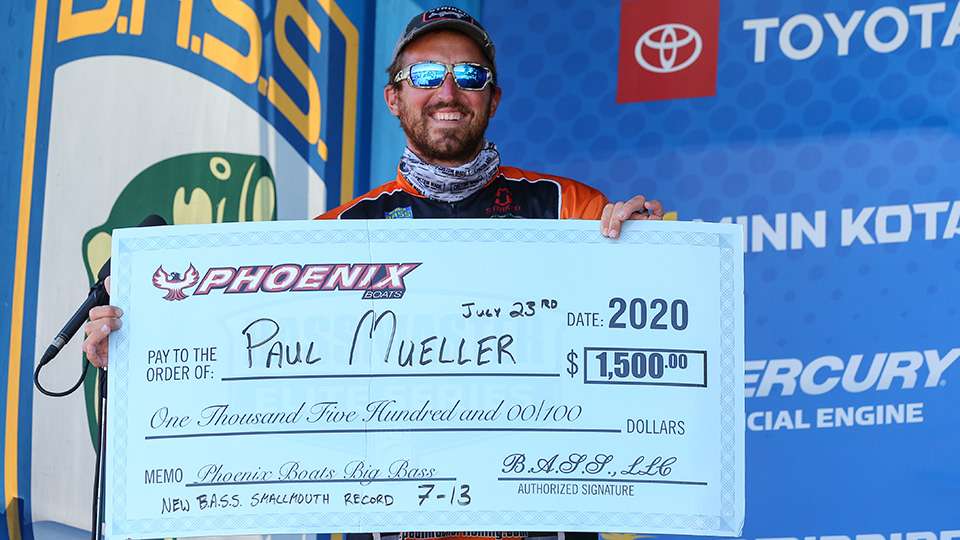 Paul Mueller with his big fish check