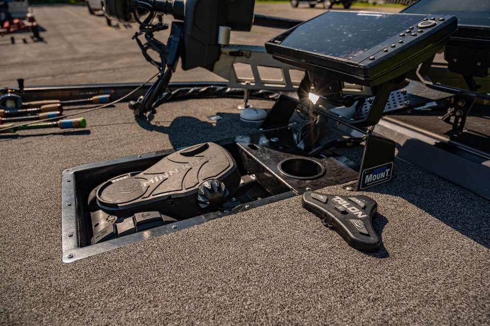 The Ultrex foot pedal is recessed in a custom tray with slots for tools in the front and a spot for his morning coffee. The Minn Kota Talon foot pedal is just to the right for easy access. 
