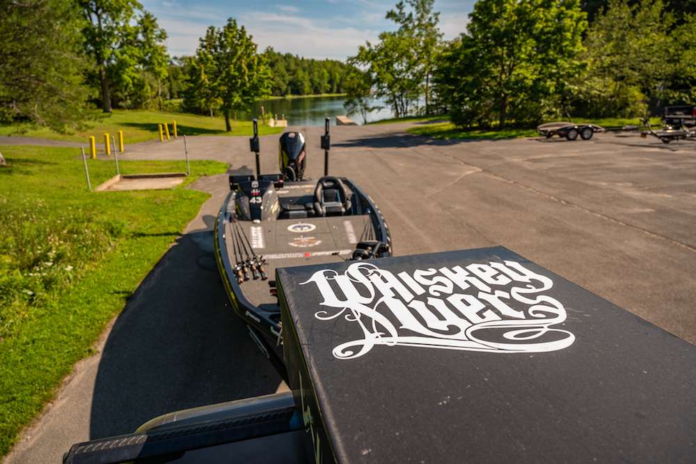 A look back from on top of the McKaig Chevy Buick-wrapped Silverado with beautiful Lake Champlain in the background. McKaig is another of Livesayâs sponsors. The storage box on top is a Custom Whiskey Myers Rod Holder.