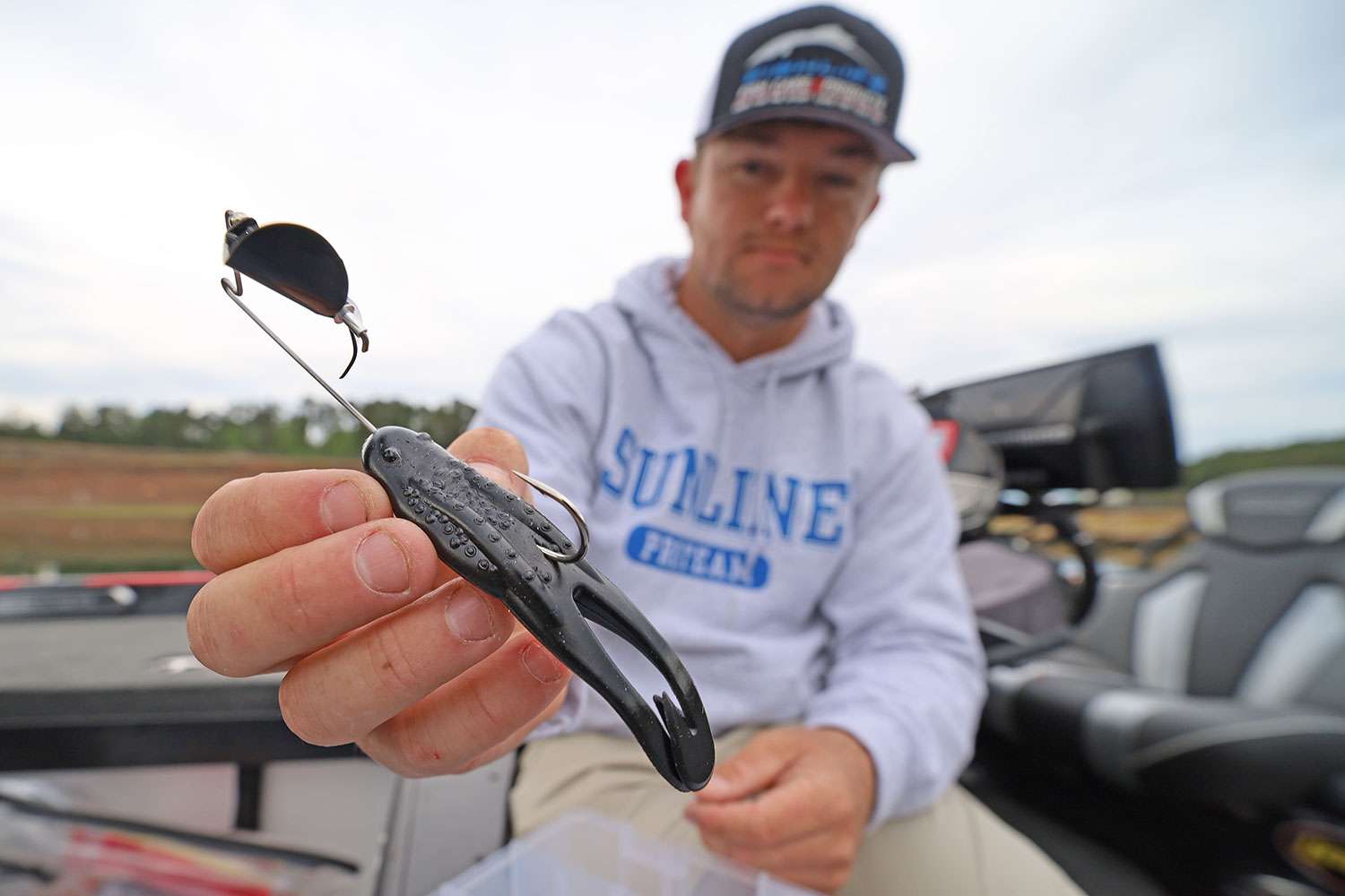 A buzzbait with a soft plastic toad. Like many other anglers, he prefers the frog to a stringy skirt. 