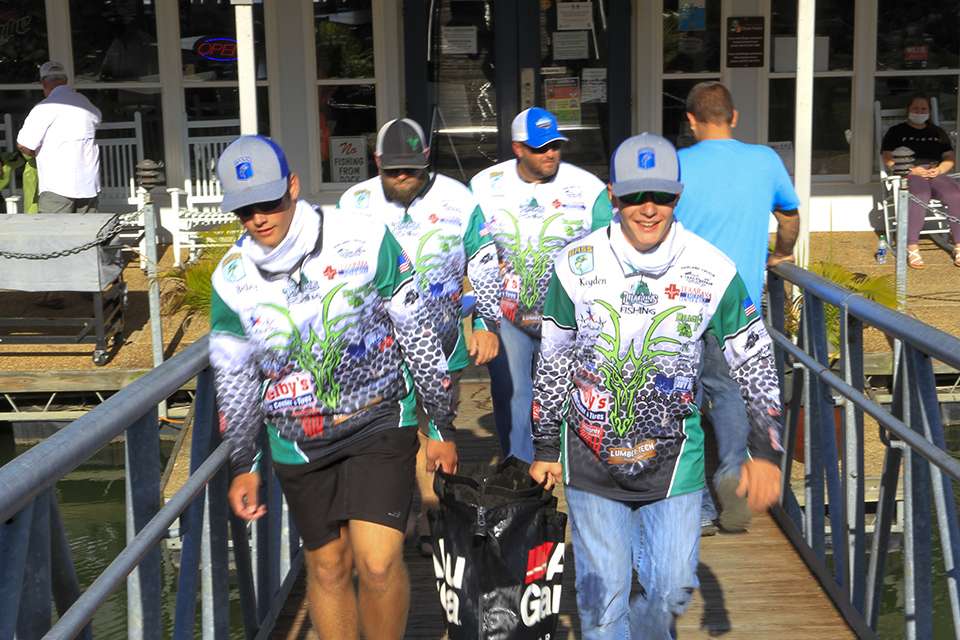 Bassmaster High School anglers bring their fish to the scales at the end of Day 1 at the Mossy Oak Bassmaster High School Championship presented by Academy Sports and Outdoors.
