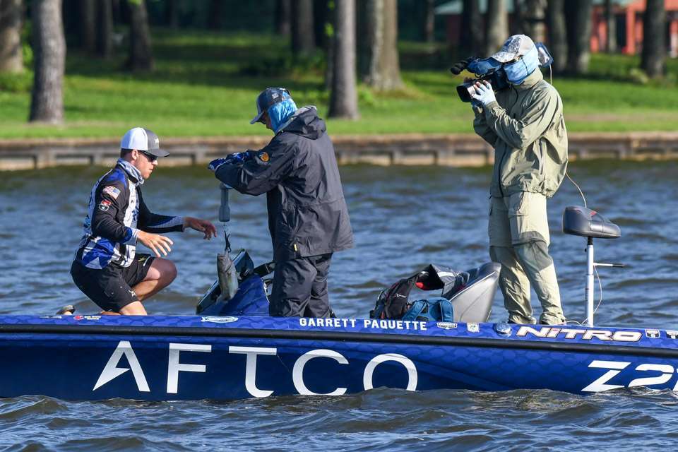 The unique format of Texas Fest requires judges to weigh and enter the fish, with the anglers releasing all but one fish above the lakeâs slot of 16 to 24 inches. Paquette, reading the scale to verify a weight to be entered in BASSTrakk and his scorecard, had one day under 25 pounds and finished with 101-15. He earned one of the Century Belts but never realistically challenged for the title.