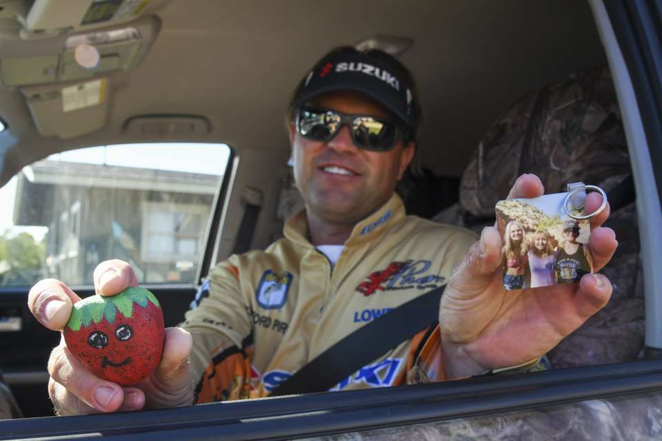 Pirch travels farther than most pros on the Bassmaster Elite Series. This photo was taken in Plattsburgh, N.Y., 2,500 miles away from his home in Payson, Ariz. That is for just one of the nine seasonal events. On his dashboard are mementos to make his 2018 Toyota Tundra feel like home. Pictured are his daughters Kailee and Cassidy, and his wife, Alicia. âThe girls painted the strawberry that is shaped like a rock.â 