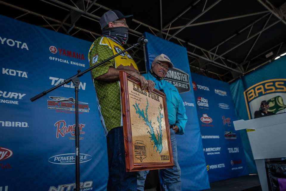 Take a look behind-the-scenes during the Championship Sunday weigh-in at the Toyota Bassmaster Texas Fest benefiting Texas Parks and Wildlife Department! In this first photos that's Judge Coordinator Tim Cook (left) presenting a plaque to former TPWD chief Dave Terre. 