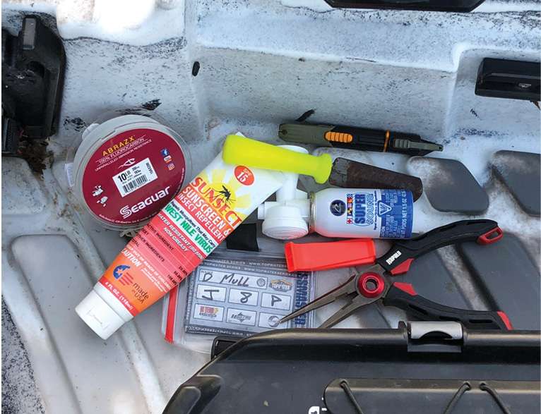 This simple project repurposes old backpacks and laptop carriers to keep those leader spools, line cutters, tournament identifiers, hook sharpeners, noisemakers and other stuff from being strewn onto your kayakâs sole (nautical term for âfloorâ). 
<p>
<em>Captions: Dave Mull</em>