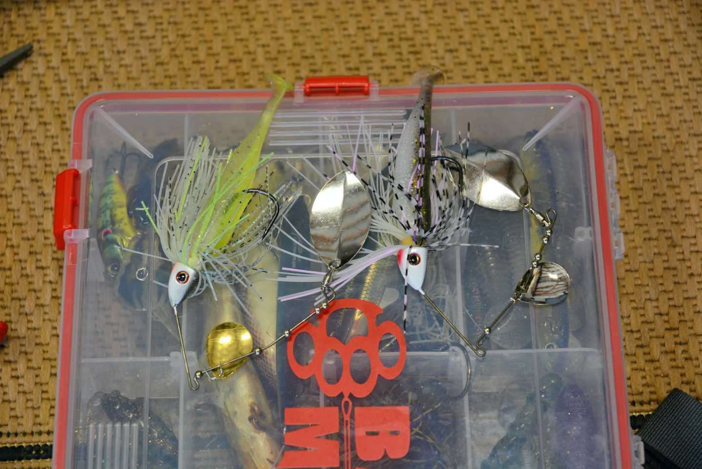 Carl packs the basic lure categories for bank fishing: Spinnerbaits, crankbaits, jerkbaits, topwaters, jigs and soft plastic baits. âDownsize those choices and pack your day box with an assortment of colors. You can also get more smaller lures into the box, so you never run out.â  