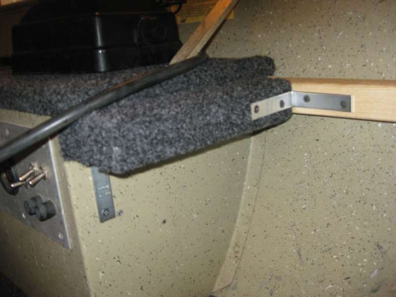 Here's a closeup of how Hoffman secured and tied the storage boxes to the gunnel of the boat. 