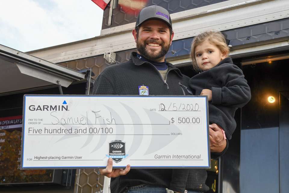 Samuel Fish get's a nice check for being the highest placing Garmin angler. 