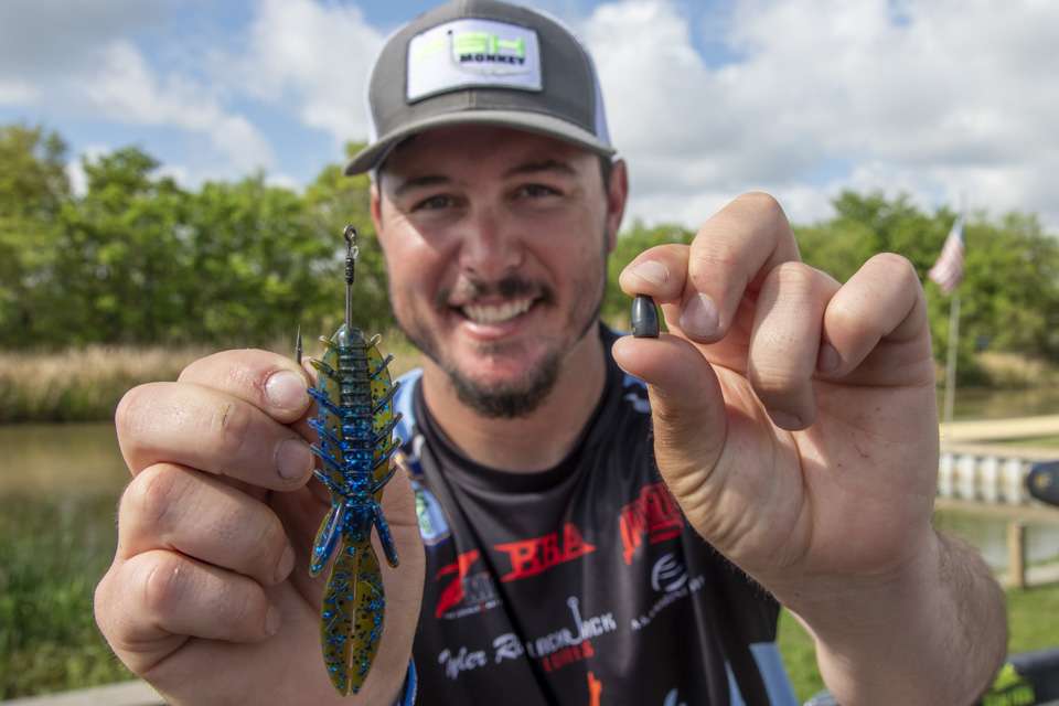 His next flipping bait is a NetBait Dagger with the same hook and weight setup: A 3/0 Owner Jungle Flipping Hook and 3/8-ounce tungsten weight. <br><br> âItâs brand new,â he said. âItâs just a slick profile that gets through grass pretty easy. Itâs definitely reaction bait: Just real quick, it goes right by bass and gets reactions. Itâs a great punching and flipping bait.<br><br> âIt looks just like a perch or a crawfish. Itâs an all-year bait, and is one of the go-tos if youâre just starting out.â<br><br> If he uses the Dagger to punch vegetation mats, he will up the weight a bit.<br><br> âThe Dagger is one my favorites to punch with,â he said. âI like punching with a weight that goes through the grass just enough so it gets through there.â 