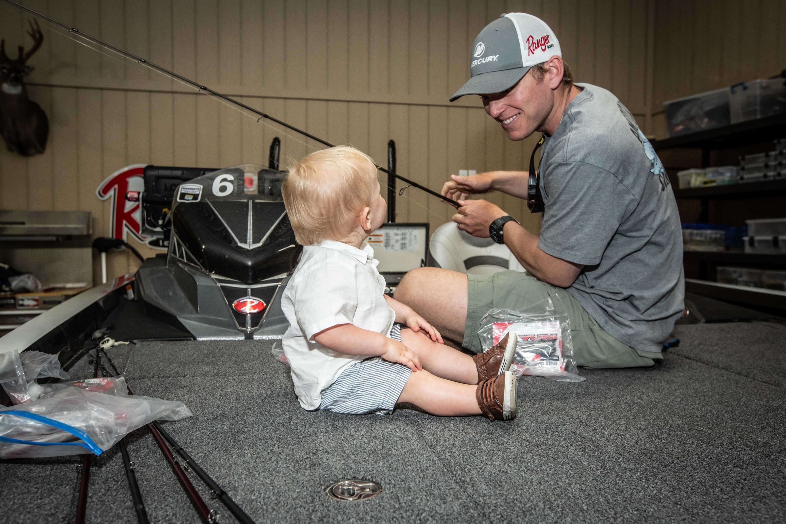 Frazier is committed to getting his young son into fishing the right way, but it all starts with mild introduction to all the components. It's more about the time together than anything.  
