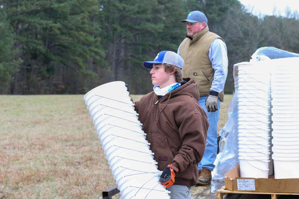 Members of Gardendale High School, Huk One Bass Club, and Alabama Power employees braved a cold morning to build over 200 FAD's. 