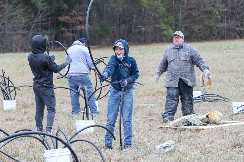 Despite the cold conditions, the High School anglers had a great time building these FAD's. 