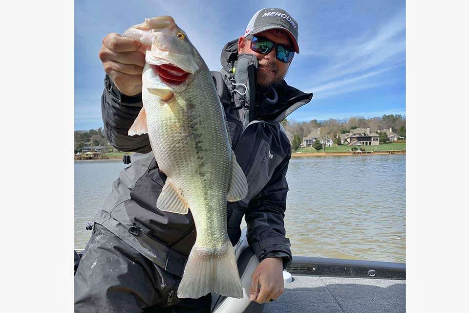 The full field fishes Days 1 and 2, with the top 50 advancing to Saturday and the Top 10 vying for the $100,000 top prize on Sunday. Drew Benton displays this nice largemouth caught during the Classic there.  