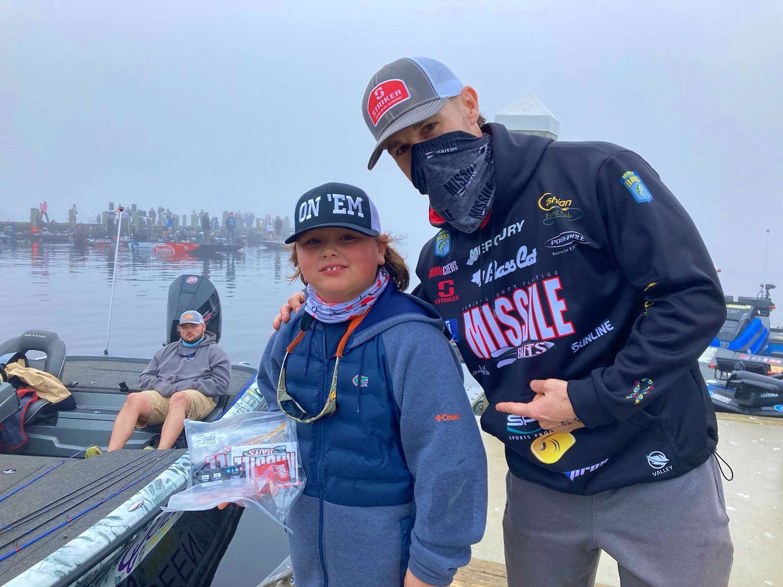 John Crews with a fan during the fog delay on Day 1 of the AFTCO Bassmaster Elite at St. Johns River 