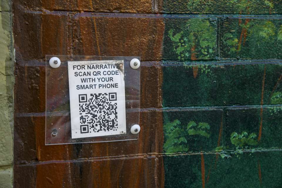QR codes affixed to the murals throughout the downtown district provide instant information about each piece of artwork.