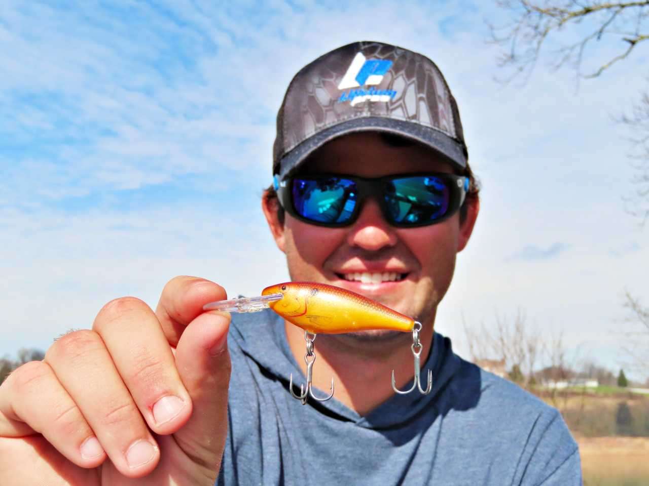 Hamilton suggests packing a utility crankbait that can work effectively at multiple depths and retrieves. âSpringtime weather can move the fish back and forth across the water column, from deep, to midrange.â 
