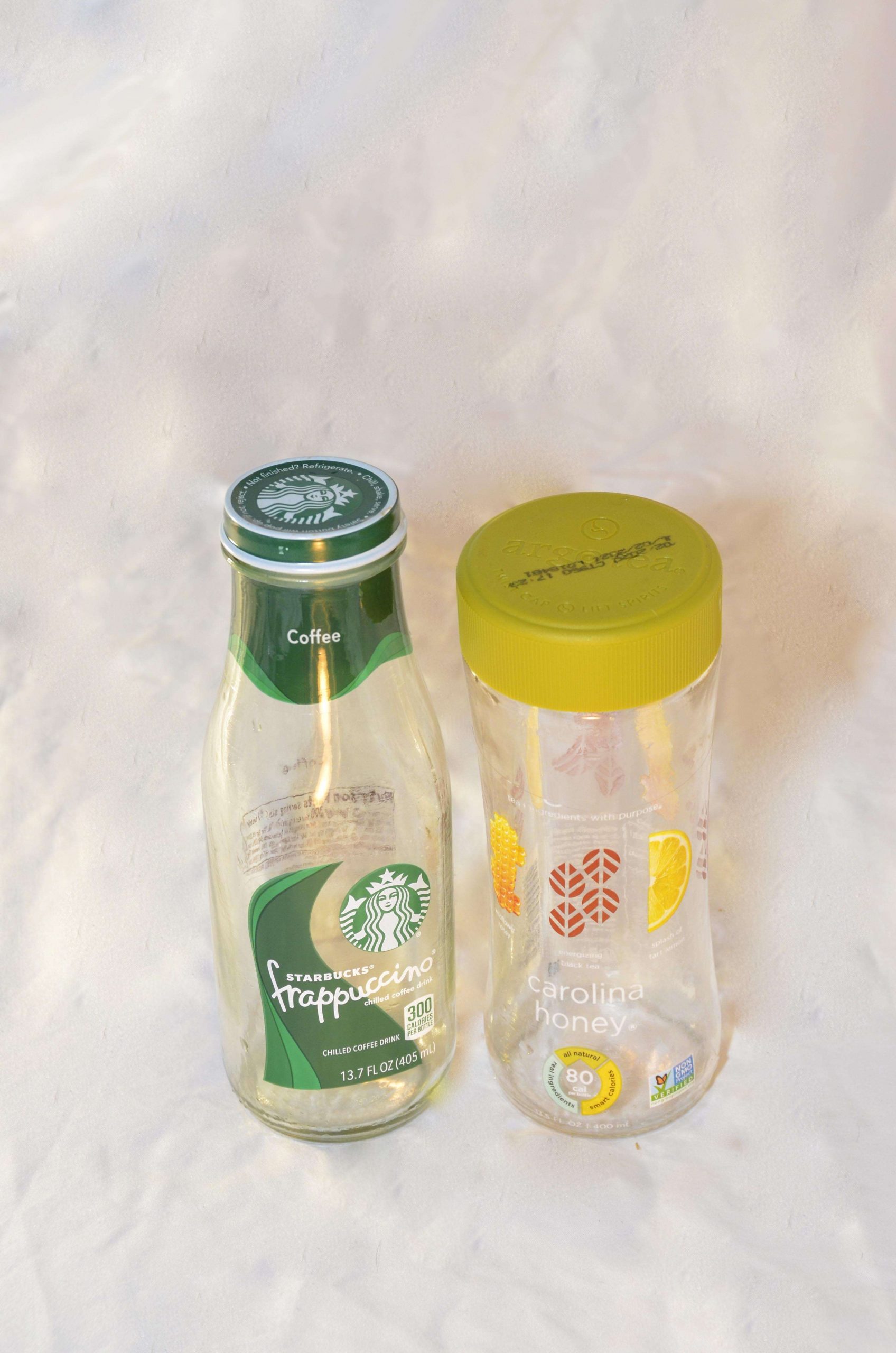 Small bottles from caffeinated cold beverages, with large openings and lids that tightly reseal become temporary but effective handwarmers after you recycle the original contents. You might need two of them, since many hold less than 14 ounces.
