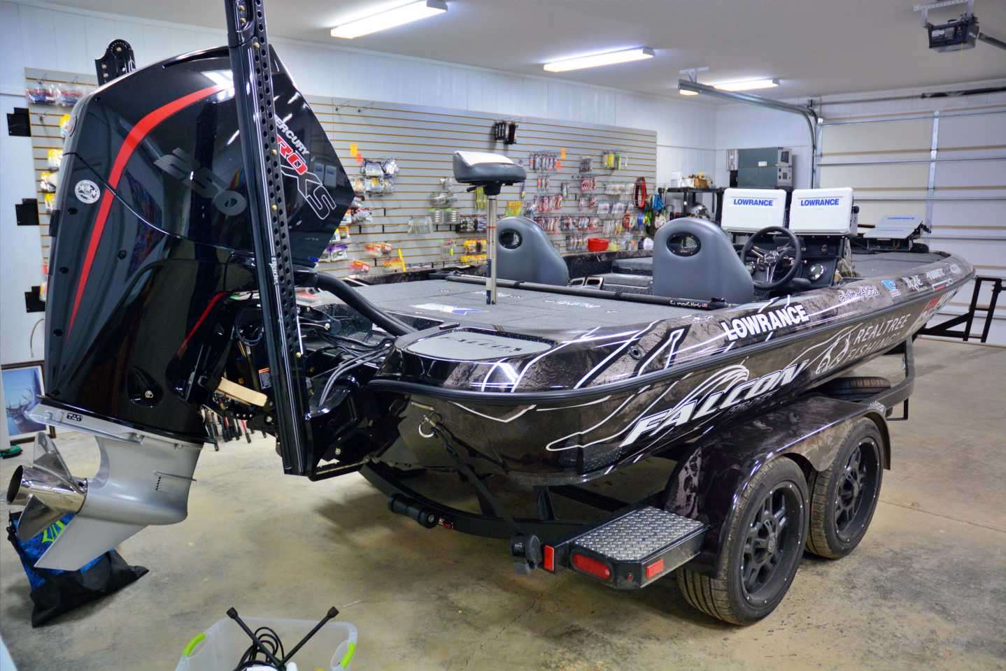 Call it a work in progress. Out with the old, in with the new. Justin Atkins had just unloaded his 2020 model Falcon Boats rig, with most of the contents on the floor surrounding his latest ride. 