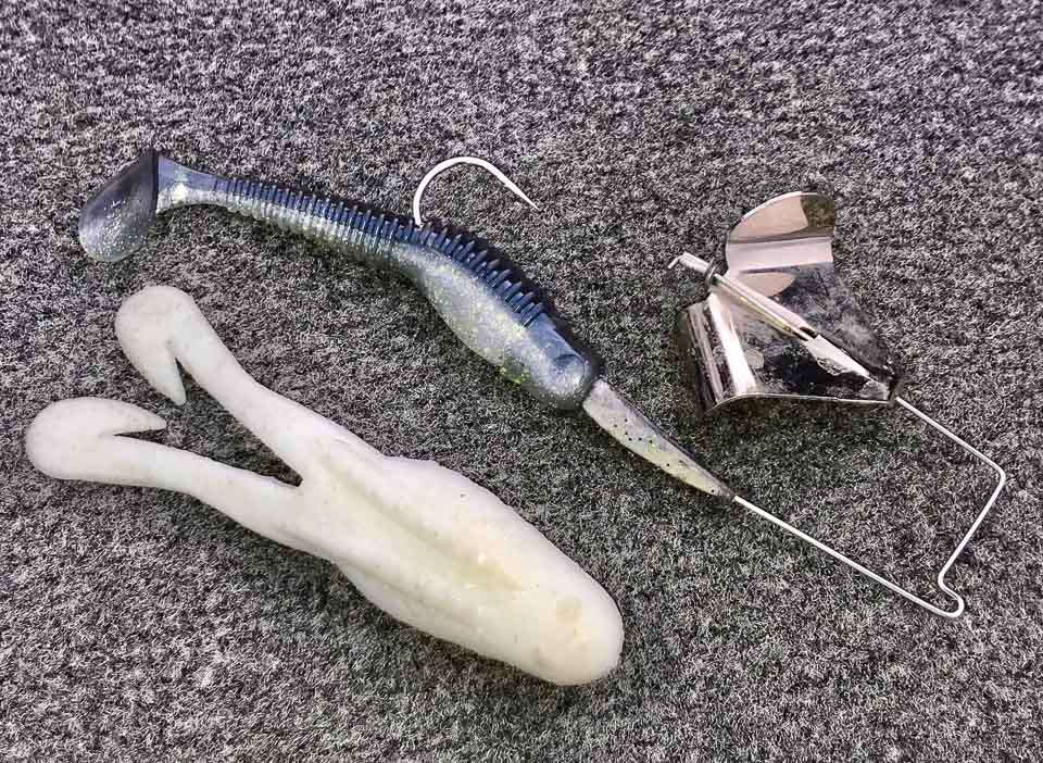 <b>Boogerman Buzzbait.</b> A great shallow water attention getter, the Boogerman Buzzbait works well with various trailers. Rivet likes a 4-inch Xcite Baits Shadnasty in open water and scattered grass, but when heâs skipping docks or overhanging trees, the buzz toadâs flatter form works best.
