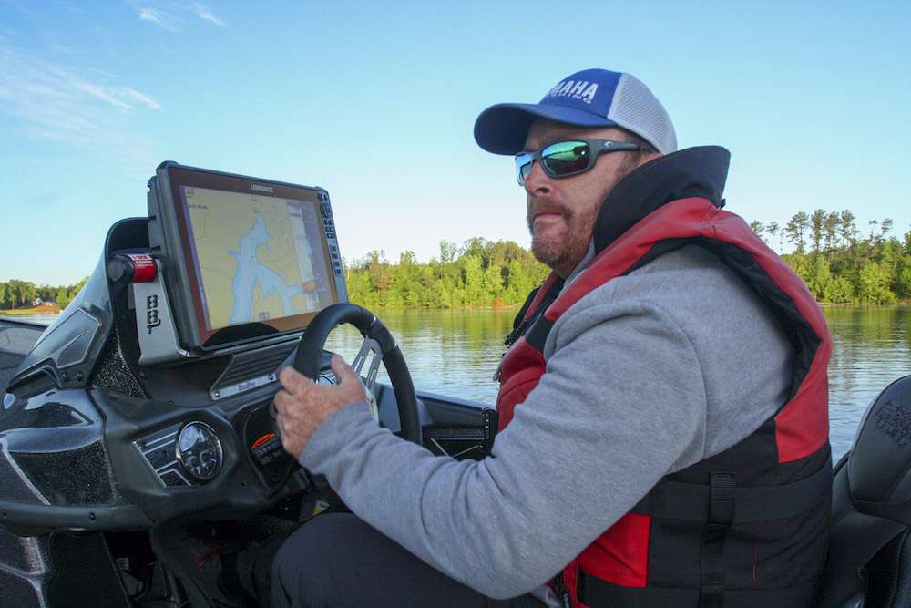 It was mid-February 2020, and Scott Canterbury was on a roll. âIâd just won 2019 Angler of the Year honors, fished my first [Bassmaster] Classic and placed sixth at the 2020 kickoff tournament on the St. Johns River,â he recalled. âI was totally fired up for the upcoming Elite season.â Then March arrived, and with it the coronavirus pandemic, forcing B.A.S.S. to cancel or postpone its remaining 2020 tournaments. This crisis might have demoralized a less competent or optimistic angler, but Canterbury knew the best way to both practice social distancing and maintain a competitive edge was to keep fishing. âDuring this so-called downtime, Iâve been hitting nearby lakes and rivers by myself and occasionally competing in local tournaments, always while taking the recommended safety precautions. Sure, itâs different right now because Iâm not touring, but hey, Iâm sitting in sixth place in 2020 Angler of the Year points, and Iâm hopeful that this health crisis will soon pass. So, dude, letâs hurry up and get this boat in the water! Iâm ready to whack some bass!â Tired of cold fronts messing up your late spring bass trips? Following the game plan that Canterbury formulated on Lake X just might result in a whack-fest of your own! (Note: B.A.S.S. announced the resumption of its 2020 tournament schedule on May 7, the day after Canterburyâs âDay on the Lakeâ outing.) <br><br>
<b>6:39 a.m.</b> I meet Canterbury at Lake Xâs deserted boat ramp. Itâs clear, calm and 52 degrees. âThis is unseasonably cool for May, and thereâs a huge cold front approaching, but the bite should be shallow,â he predicts. âThe weather here has been supervolatile this spring â 80s one day, 50s the next. I could find bass in all three stages of spawning. Points leading into shallow spawning bays should hold both pre- and postspawn fish.â
<BR><BR>
<B>7 HOURS LEFT</B><BR>
<b>6:45 a.m.</b> We launch the Skeeter. The water near the ramp is 62 degrees and stained. Canterbury pulls several of his signature Halo rods paired with Ardent reels from storage; his lure arsenal includes jigs, swimbaits and topwaters. <br>
<b>6:52 a.m.</b> Canterbury runs to a rounded point with a seawall in a nearby tributary arm and makes his first casts with a Bagley Knocker B surface plug. <br>
<b>6:54 a.m.</b> He slow rolls a Â­6-inch albino shad Megabass Magdraft swimbait parallel to the seawall. âSwimbaits arenât just for clear water! This big white one is visible in murky water and puts out tons of vibration.â <br>
<b>7:03 a.m.</b> Canterbury cranks a shad pattern Strike King 5XD diving plug around a rock point. âIâm seeing fish suspended at 12 feet, but they may be crappie.â
