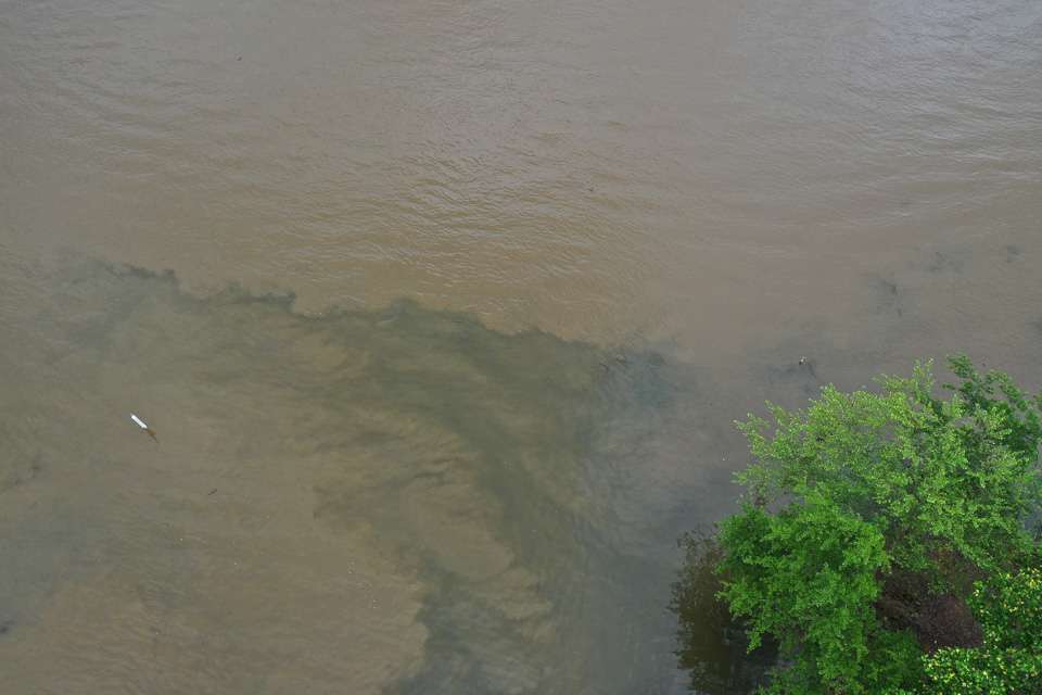 This photo is a good example of whatâs going on right now. The mixing of the waters, where clearer water is being drawn by the swift current, into the muddier river channel. 