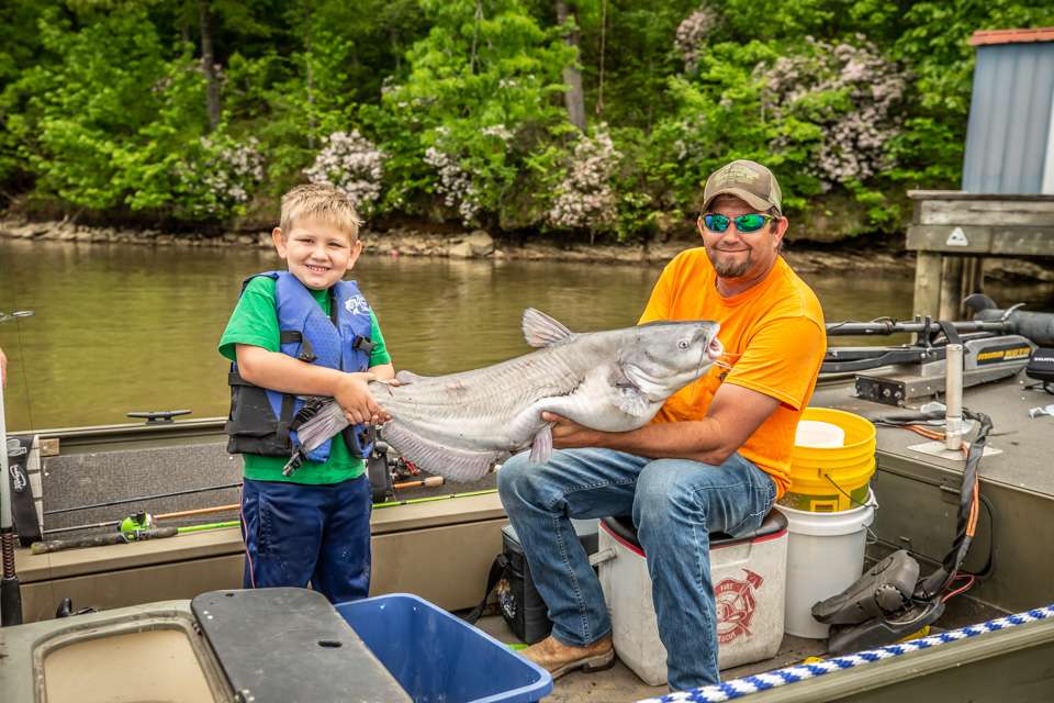 Todd Auten and Clent Davis are neck and neck, on Day 2, in the top 10 at the 2021 Whataburger Bassmaster Elite at Neely Henry. But first we came across a father and son who had just caught a giant catfish. 