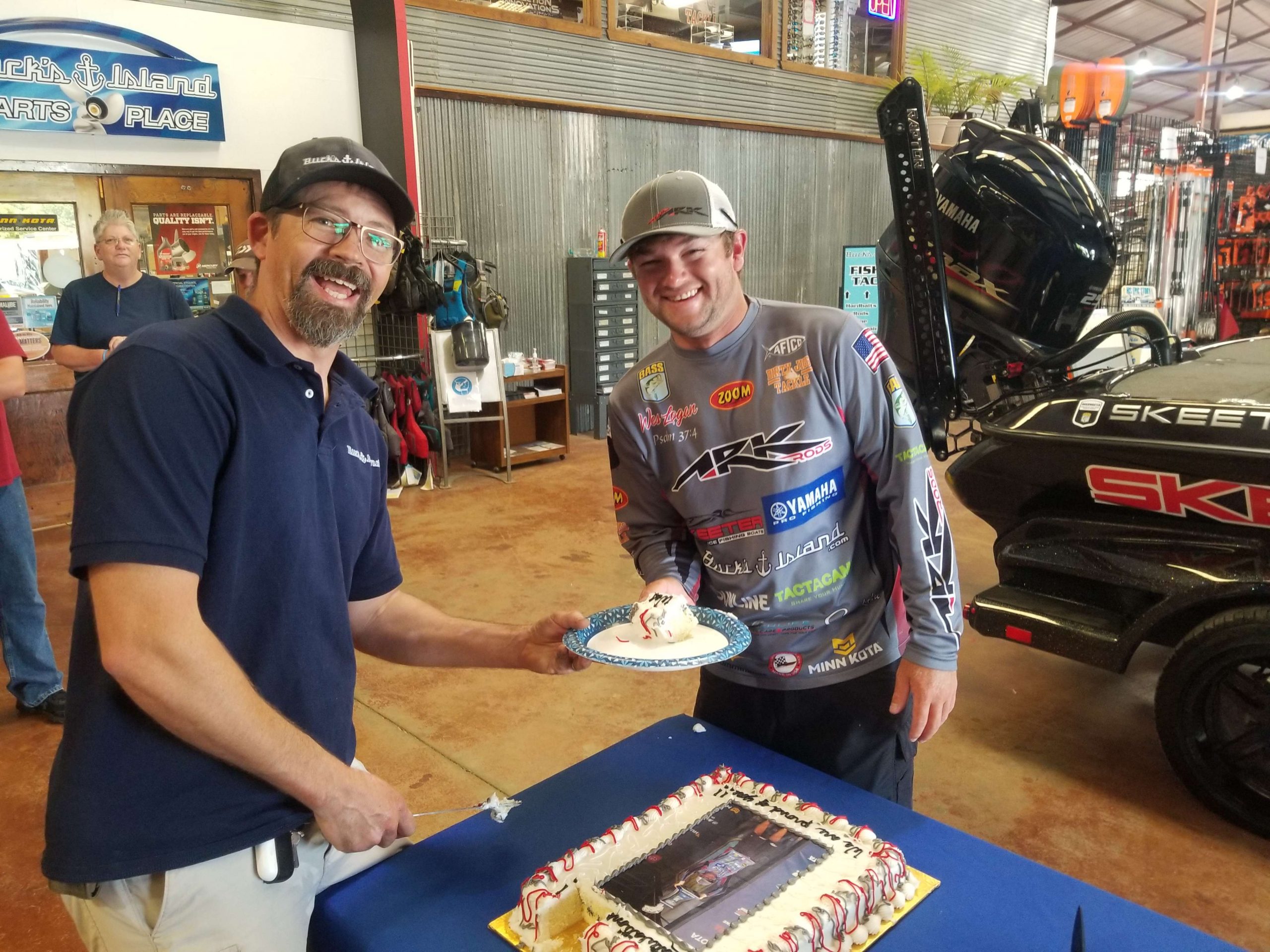 Staff, family, friends and fans came in, chatted, took pictures, got autographs and ate cake complete with a trophy shot from the Elite Series stage at Coosa Landing.  Even B.A.S.S. Chairman Chase Anderson made an appearance to congratulate the newest Elite Champion. 