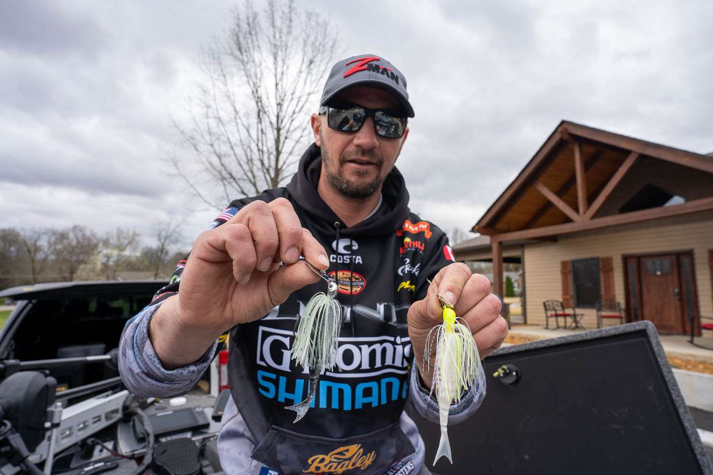 In his left hand is the Z-Man ChatterBait Custom, which he says not as many people talk about as they should. 
