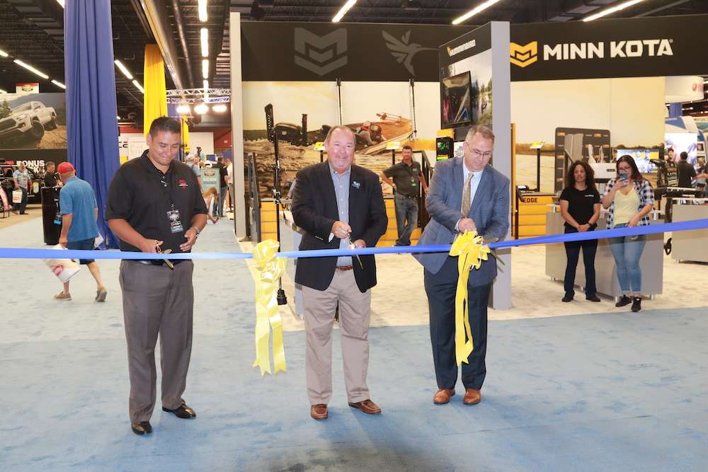 Expo ribbon cutting with Jason Sands of the Fort Worth Sports Commission, B.A.S.S. CEO Bruce Akin and Dan Book, Academy Sports and Outdoors District Manager-Fort Worth Area.
