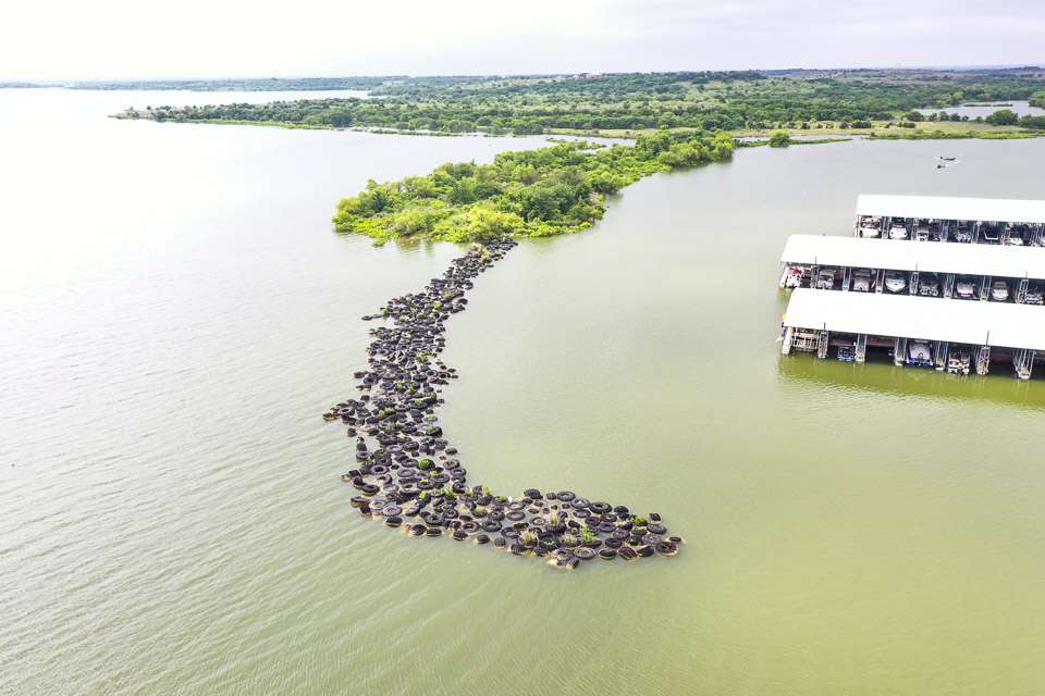 A tire reef provides ideal cover for baitfish and an ambush point for the bass. 
