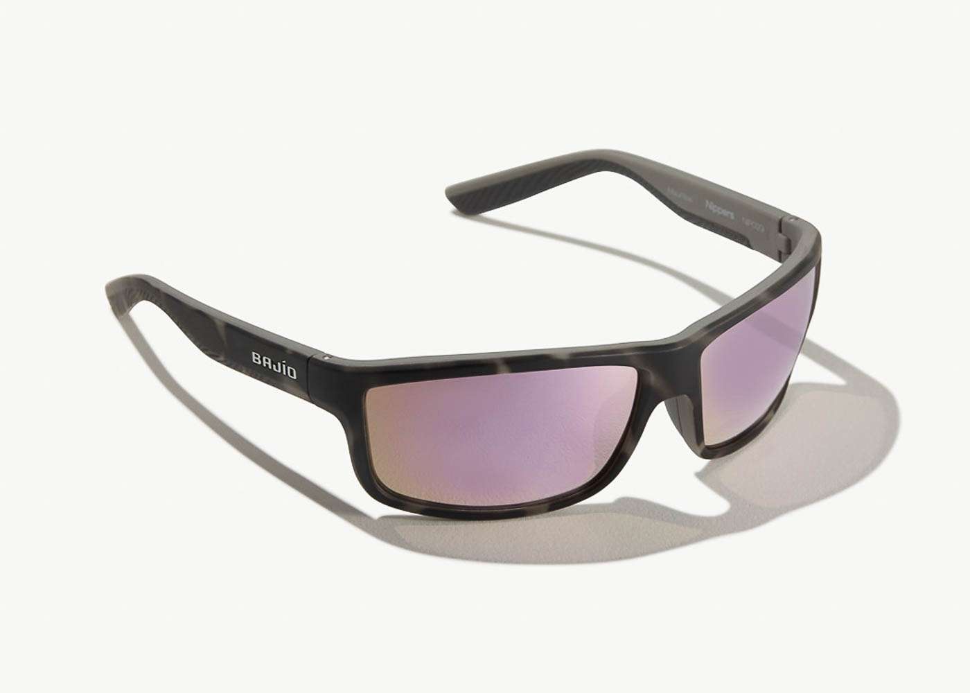 <p><strong>Bajio Nippers Sunglasses</strong></p><p>Casual style and technical features define Nippers. Wide, curved lenses provide enhanced field of vision, and LAPIS polarized lens technology slices through glare for better fish-spotting. Blue light-blocking coating prevents eye fatigue to maintain visual acuity during marathon days in the sun. This technology blocks 95% of harmful blue light. The low-density, bio-based nylon frames are lighter than traditional oil-based polymersâyet also provide higher strength and impact resistance. $199 Plastic Lenses. $249 Glass Lenses. <a href=