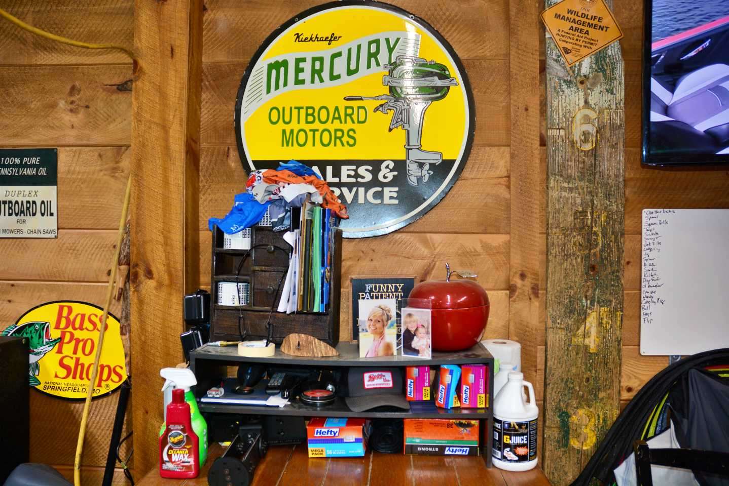 Above the desk are family tokens and items used to keep tackle and gear organized and ready for the road.