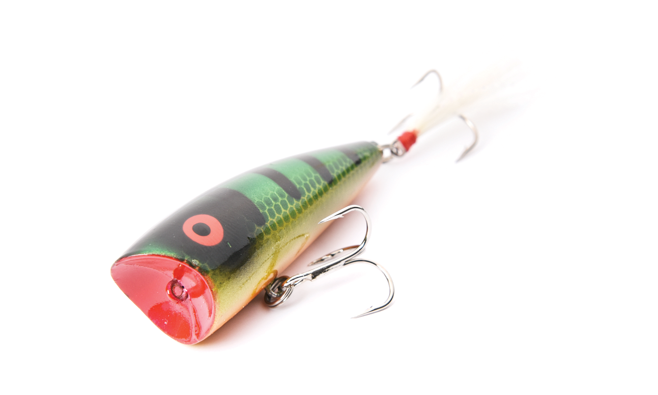 <b>No. 3 - Rebel Pop-R</b><br> Stoudenmire describes the Pop-R as the most versatile and the premier surface lure for summertime action. âYou can fish a Pop-R through a current break, dead drift it next through shade pockets, then pop-pop-pause across a ledge,â he says. âAnd catch big smallmouth in all those places.â <br><br> Lure Specifics: Rebel Pop-R Plus in red eye perch. 