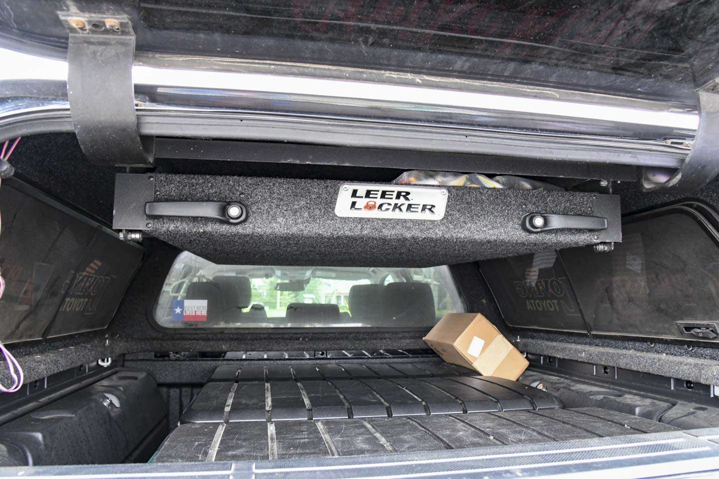 Combs added aftermarket storage systems to the bed of the truck to organize his equipment.
