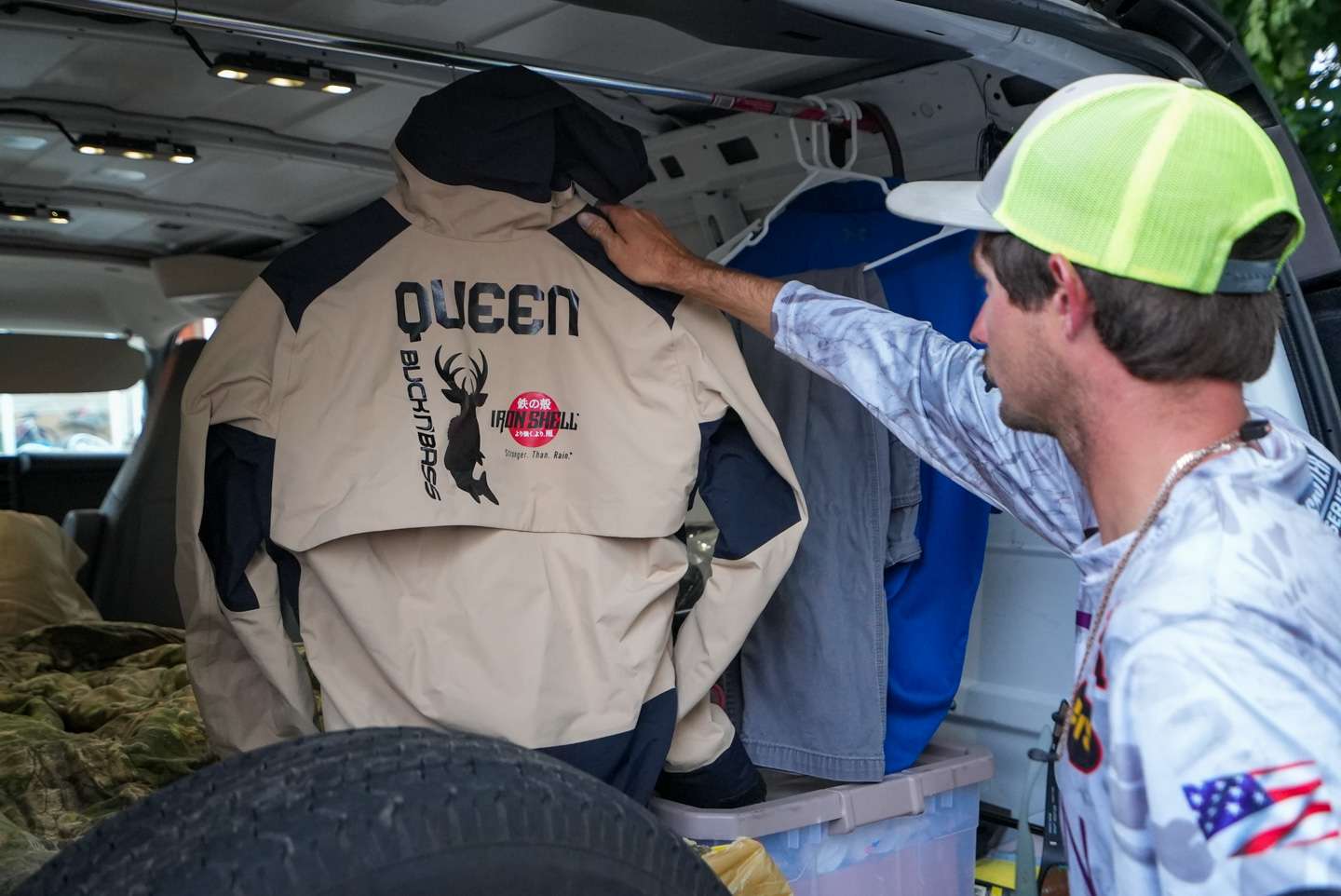 Queen placed a bar across the back of the van to hang his rain suit and other clothes from. 