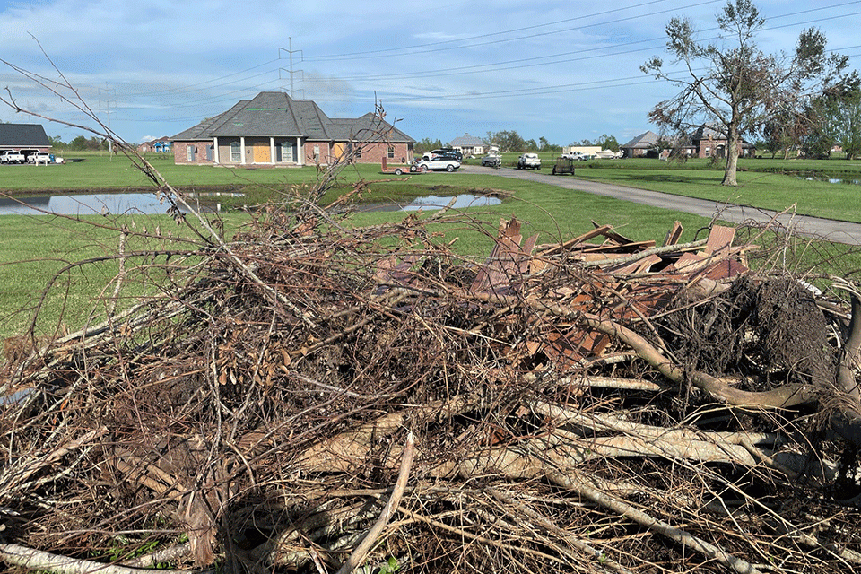 Tyler Rivetâs hometown of Raceland, La., was hit badly by Hurricane Ida. The highest recorded winds in town were 174 mph. A pile of debris lies near the street leading to his motherâs home.