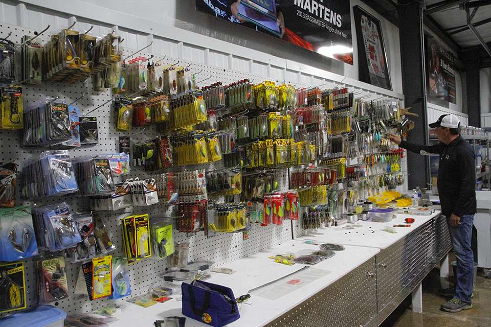 He also has a work bench along that wall for tinkering and tackle prep. Here he will grab specific baits and load them into an empty box. Some are niche baits that only get used on certain lakes or specific times of year.