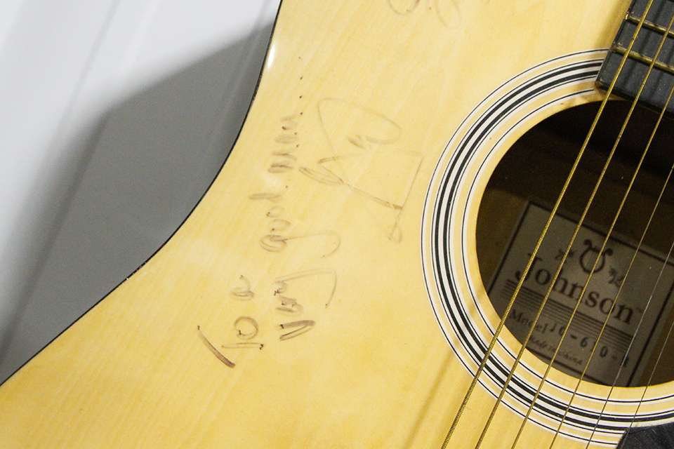 Clouse's good friend Stevie Ray Anderson signed the guitar as did other musicians at a fishing event in Nashville.