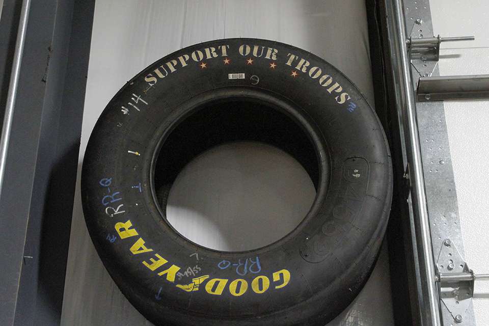 He has a NASCAR tire hanging in the shop from Rusty Wallace. 