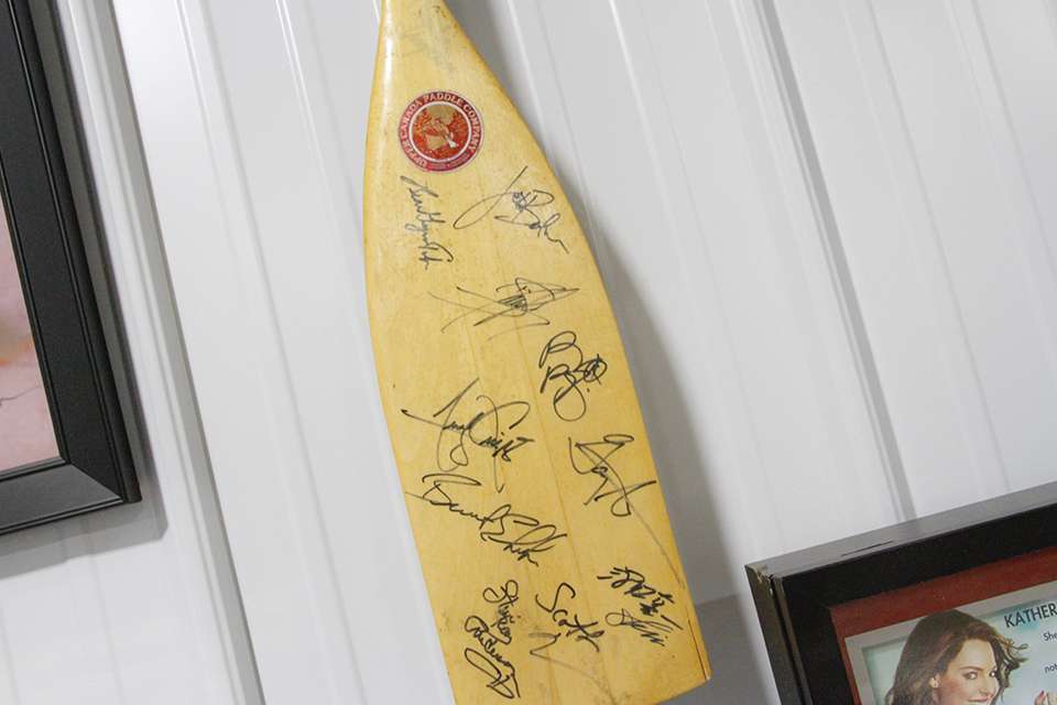 And a boat paddle littered with angler signatures.