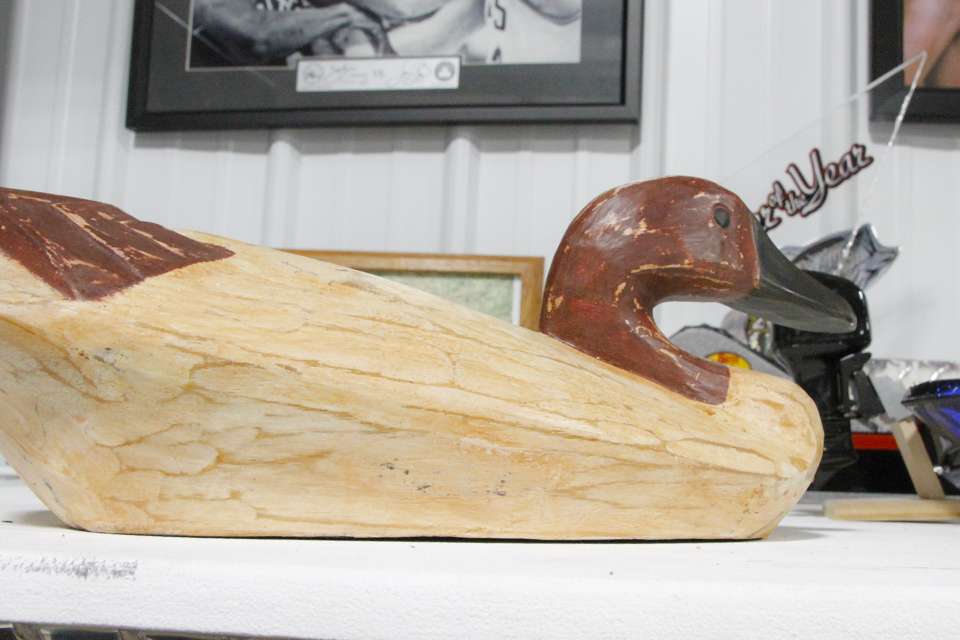 Clouse has an old wooden duck carving on his work bench as well.