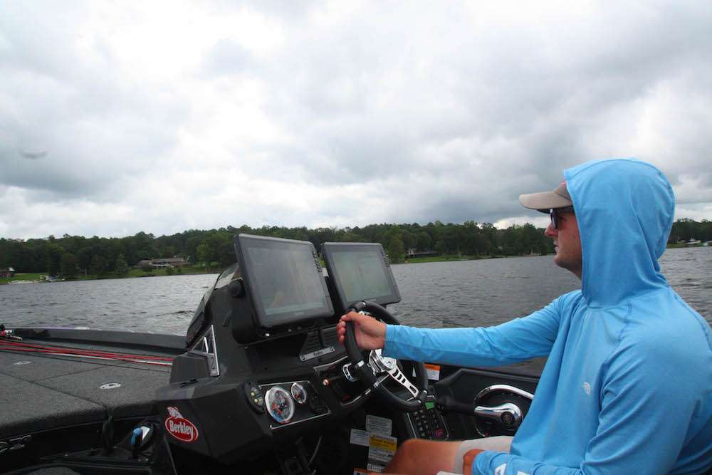 <b>11:28 a.m.</b> LeHew exits the creek arm and returns to the main lake, where he patiently idles around while eyeballing his electronics for scattered cover, baitfish and groups of bass. âIâm marking a lot of bait but most of it is suspended; the best scenario today would be to find bait clustered around scattered bottom cover in the 10- to 12-foot zone. Frankly Iâm not seeing a lot of that, but Iâm marking the waypoint every time I do see it.â
<br><br>
<b>2 HOURS LEFT</b><br>
<b>12:01 p.m.</b> LeHew is back on the brushpile where he lost a good fish earlier. He hits it first with the 14.5, then with the shaky head worm. âIâm seeing a couple fish in that brush on my LiveScope.â <br>
<b>12:14 p.m.</b> LeHew pitches the spoon to the brushpile. âYou want to let the spoon flutter down on a semi-tight line, then pop it with your rod the instant you feel it hit the cover. If you let it sink down into the brush too far, youâll hang up every time.â <br>
<b>12:17 p.m.</b> He drops the Roboworm straight down into the brushpile and shakes it. No takers. <br>
<b>12:19 p.m.</b> LeHew hangs the Roboworm in the brush, breaks it off and drops the shaky head worm into the cover. <br>
<b>12:23 p.m.</b> LeHew moves to another brushpile and crawls/hops/shakes the jig through the gnarly branches. <br>
<b>12:31 p.m.</b> LeHew moves to a nearby rounded point with a seawall and tries the shaky head worm.

