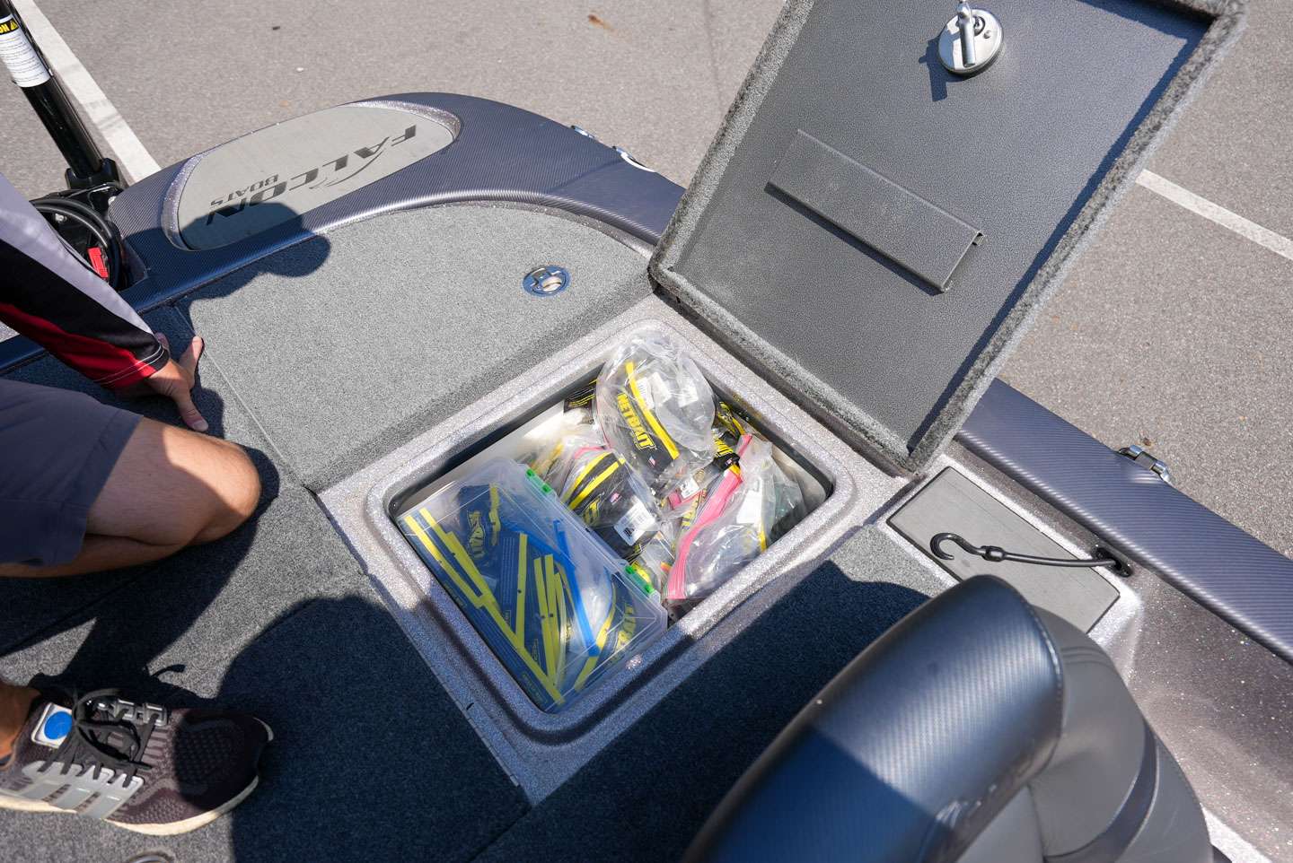 The compartment behind the passenger seat is home to more tackle. 