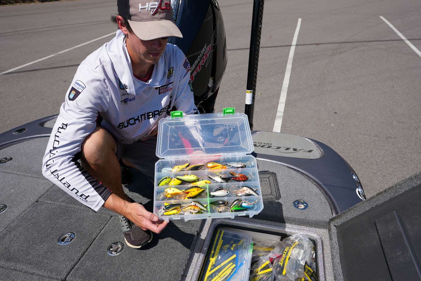 A box of old balsa crankbaits is the first one that Hamner pulls out. 