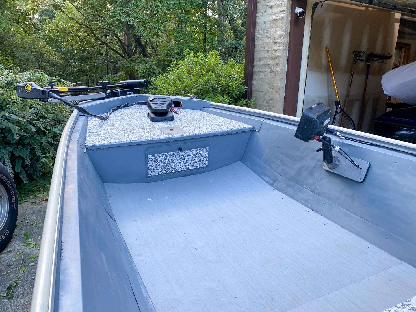 The front deck with trolling motor and electronics installed. The head unit of the display can be tilted toward the transom when Iâm running the Vantage, or shifted to the bow when Iâm using the Edge.
