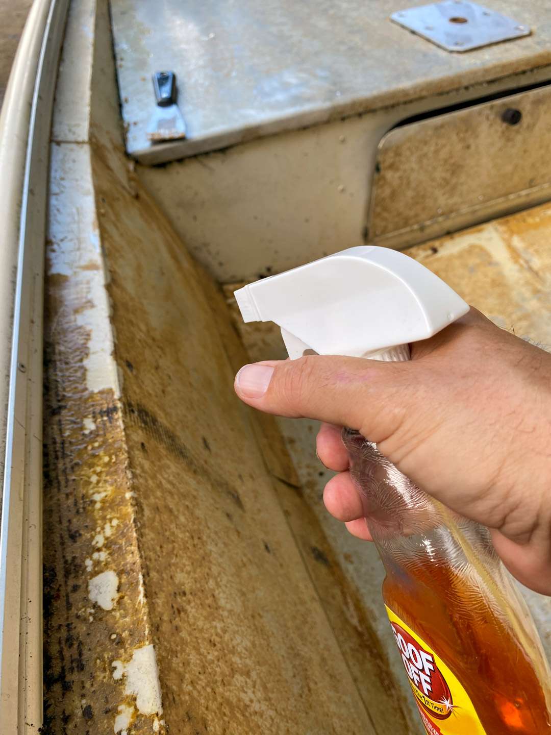 I first tried removing the glue using Goof Off and a scraper. This was good for the areas with really heavy glue residue. Be sure to wear a respiratorâ¦ this chemical is powerful.
