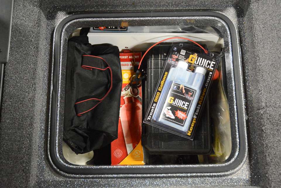 In a storage behind the driver seat is T-H Marine G-Juice additive for the livewell, a fire extinguisher and lots of tools. âThe biggest mistake I see guys do on the water is not having enough tools,â Arey said. 