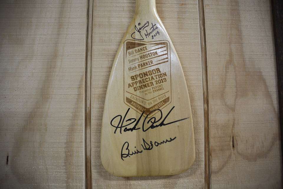 This is one of Areyâs prized possessions in the cave. Itâs a commemorative boat paddle given to guests at a Quaker State sponsor appreciation held at a Classic. âHank Parker, Bill Dance and Jimmy Houston were my heroes early on in my bass fishing career and even before then.â The paddle is signed by each of the icons. 